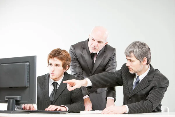 Boss and trainee learning from a manager — Stock Photo, Image