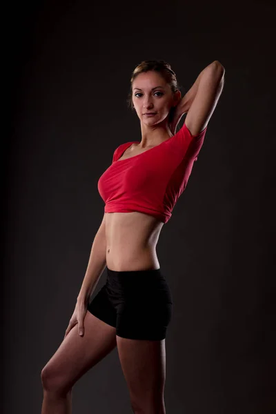Natural slim woman showing her good shape — Stock Photo, Image
