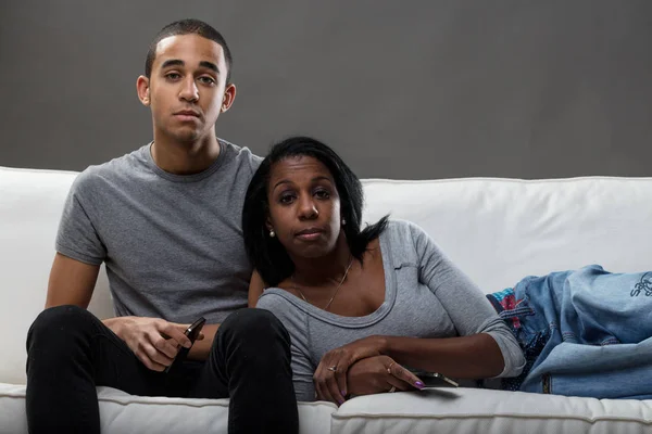 Modern studio portrait of mother and son — Stock Photo, Image