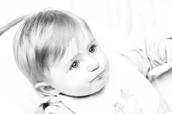Infant girl black and white candid portrait — Stock Photo, Image