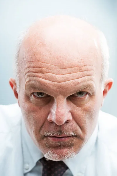 Bad worker frowning at camera — Stock Photo, Image