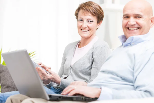 Genuine couple with lovely beaming smiles — Stock Photo, Image
