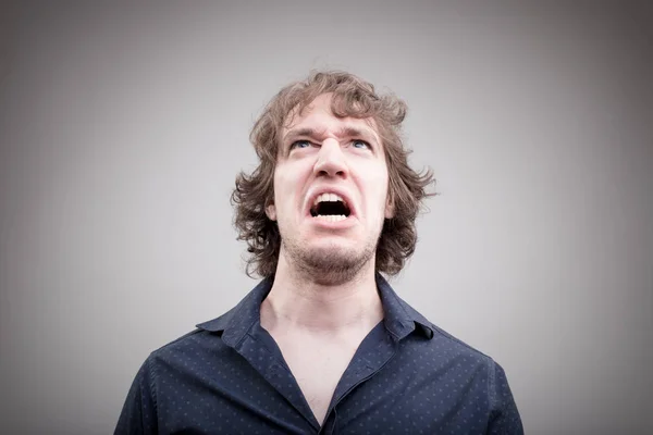 Angry man shouting and cursing — Stock Photo, Image