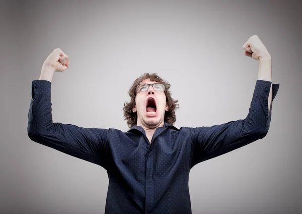 Man winning and exulting with a strong expression — Stock Photo, Image
