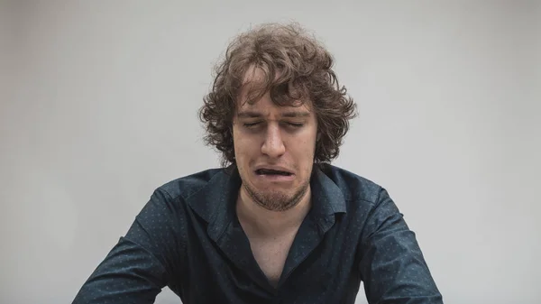 Sad man crying in a down despair — Stock Photo, Image