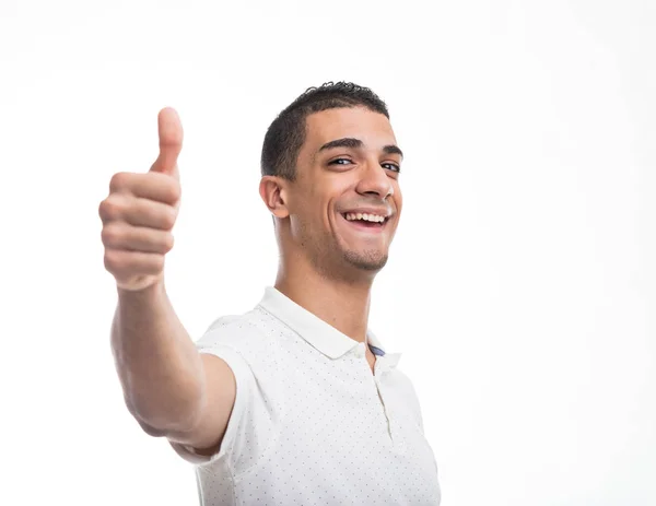 Young cheerful man giving thumb up — Stock Photo, Image