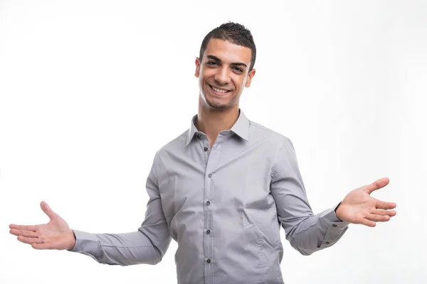 Young cheerful man with open arms gesture — Stock Photo, Image