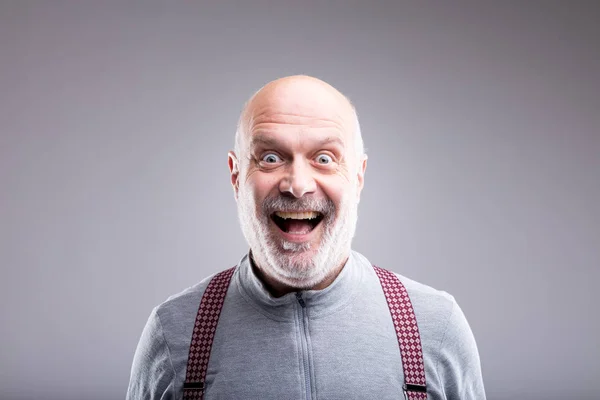 Overdreven oude man smile expressie — Stockfoto