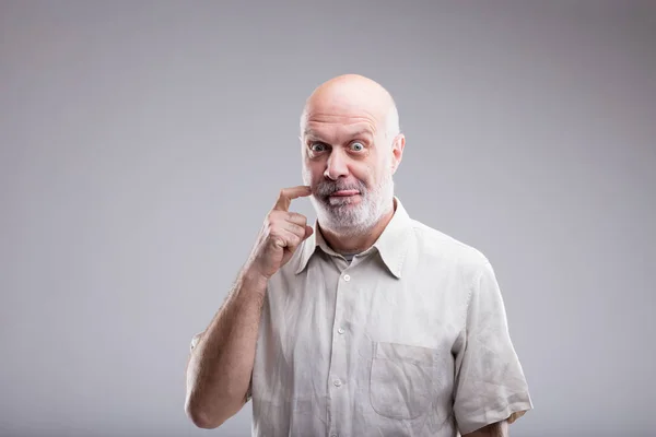 Gluttonous bald old man says yummy — Stock Photo, Image
