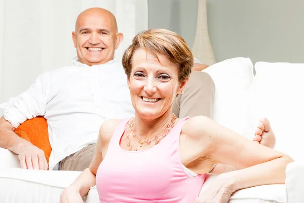 Attractive happy confident middle-aged couple — Stock Photo, Image