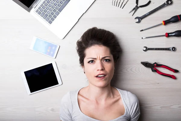 Intense look of a woman with digital problems — Stock Photo, Image