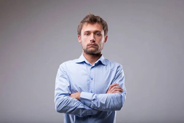 Homem sem emoção com uma expressão de deadpan — Fotografia de Stock