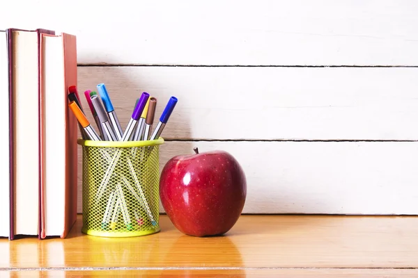 Concept back to school accessories on green background — Stock Photo, Image