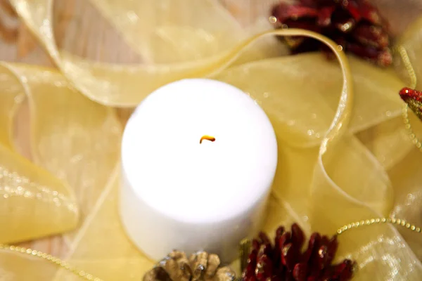 White candle with Christmas decorations — Stock Photo, Image