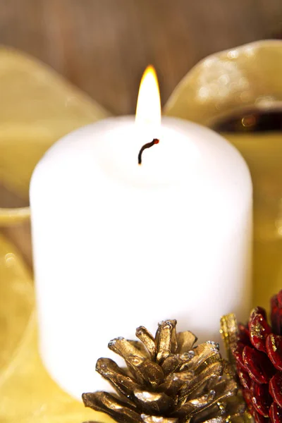 White candle with Christmas decorations — Stock Photo, Image