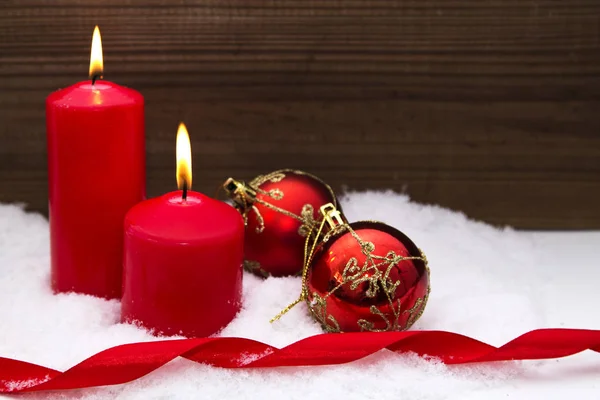 Merry christmas card with candles and christmas baubles — Stock Photo, Image