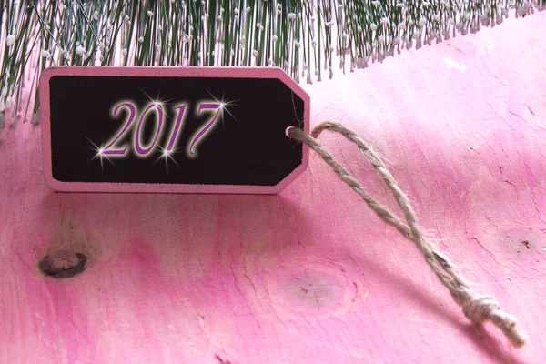 Ευτυχισμένο το νέο έτος κάρτα σε ροζ φόντο — Φωτογραφία Αρχείου