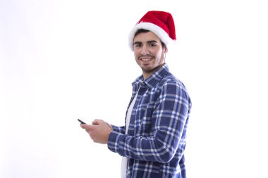 Noel Baba ve telefon mobil şapkalı erkek genç