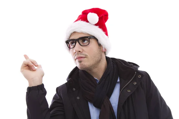Junger Mann mit Weihnachtsmannmütze und Brille, die mit Händen zeigt — Stockfoto