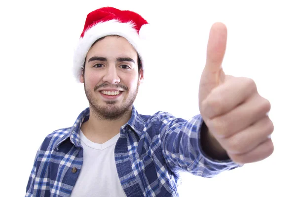 Männlich jung mit Hut des Weihnachtsmannes tut Zeichen von ok — Stockfoto