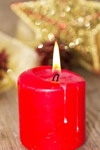 Christmas card with red candles and Christmas decorations — Stock Photo, Image