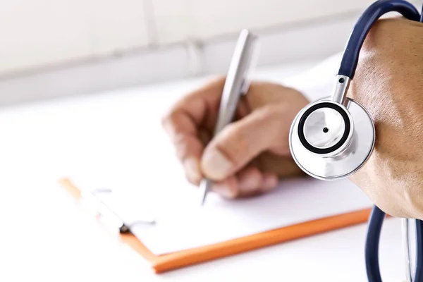 Stethoscope with doctor's hands, healthcare — Stock Photo, Image