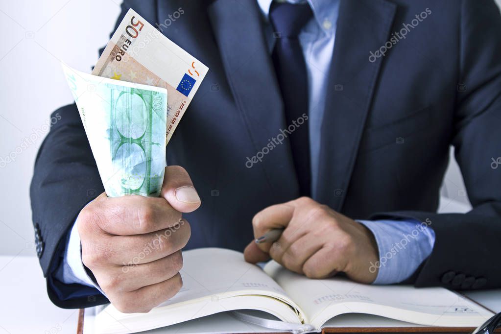 business man hands grabbing money