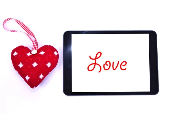 Gift box and tablet with valentine's message — Stock Photo, Image