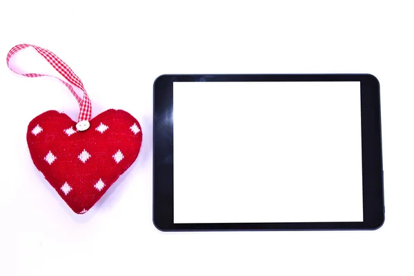 Heart-shaped tag and tablet — Stock Photo, Image