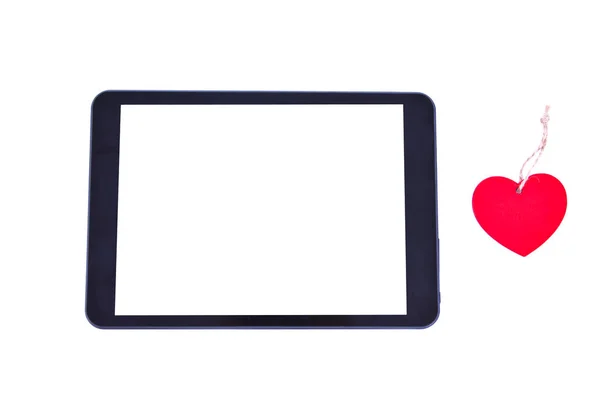 Heart-shaped tag and tablet — Stock Photo, Image