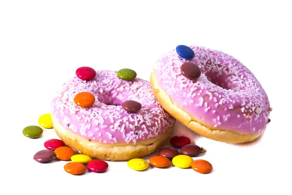 Donut with sprinkles and smarties isolated — Stock Photo, Image