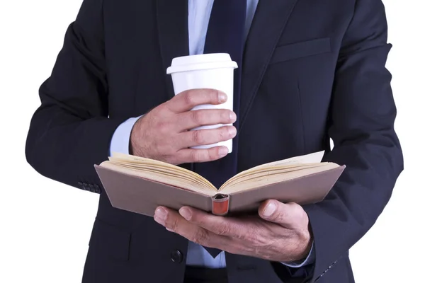 Geschäftsmann mit Kaffee und Buch — Stockfoto