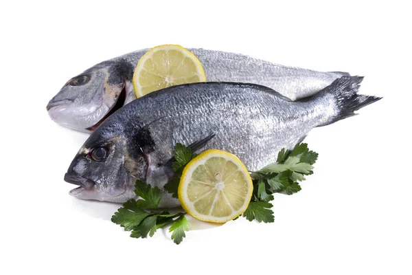 Fish, golden isolated with parsley and lemon — Stock Photo, Image