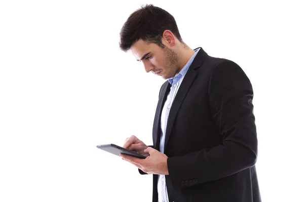 Joven con el comprimido aislado en blanco — Foto de Stock