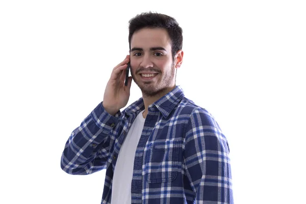 A fiatalember beszél a mobiltelefon — Stock Fotó