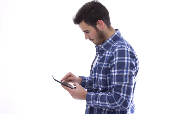 Genç adam bir tablet kullanma — Stok fotoğraf