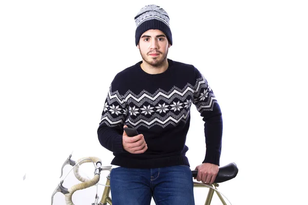 Νεαρός άνδρας με το ποδήλατο και το κινητό τηλέφωνο — Φωτογραφία Αρχείου