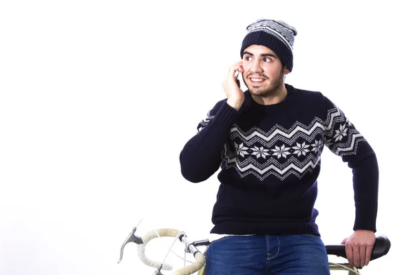 Jovem com bicicleta e telefone celular — Fotografia de Stock