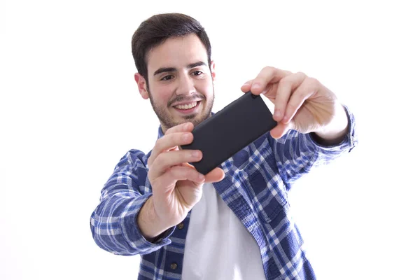 Young man making a self portrait Stock Image