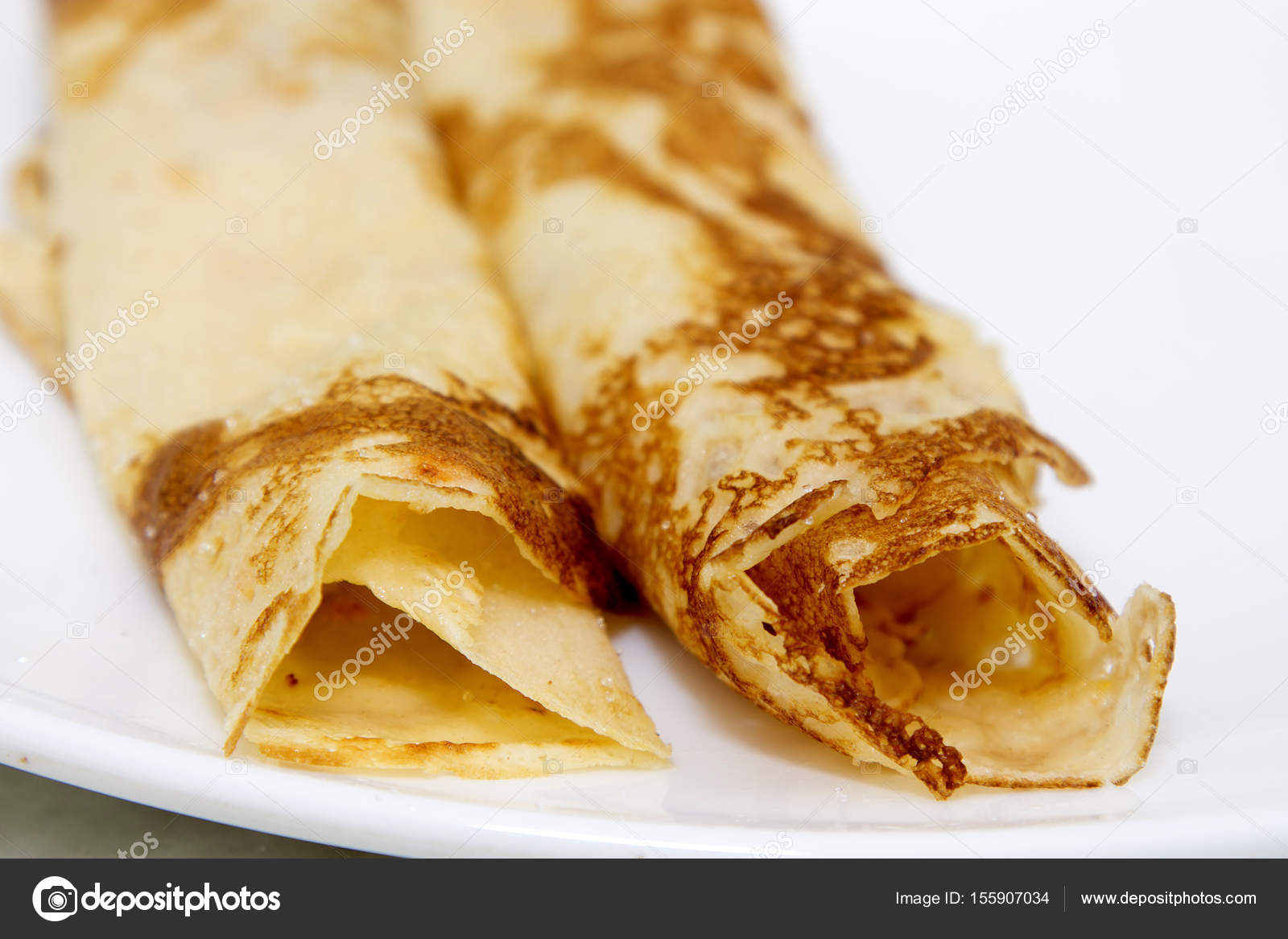 Crepes and pancakes freshly made chocolate — Stock Photo © tetxu 155907034