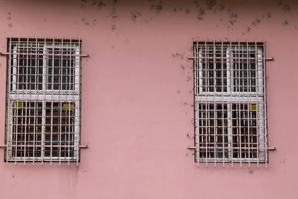 pink window in pink buildings