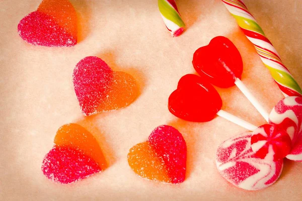 valentines greeting with heart candies and lollipops