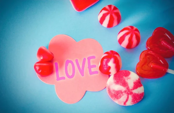 Congratulatory Card Gummy Candies Heart Shaped Lollipops Blue Background — Stock Photo, Image