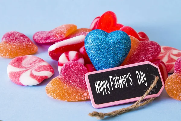 cell phone with heart lollipops , fathers day card