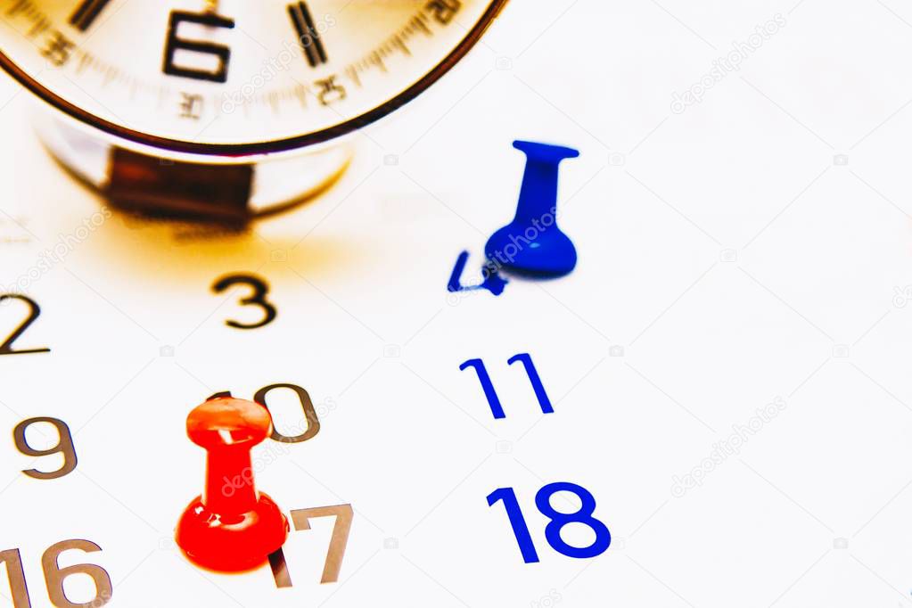 calendar and alarm clock with reminder thumbtacks