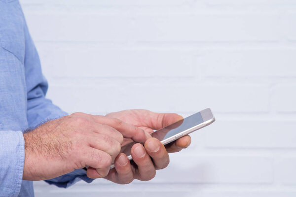 using the cell phone, close up