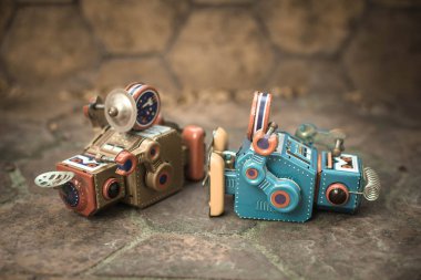 Enerji, vintage renk stili, vintage sesi arka plan kaybetti eski robot oyuncak.