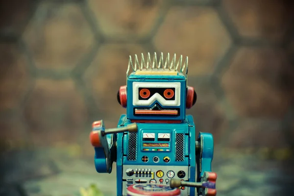 Old robot toy, vintage color style, vintage tone background. — Stock Photo, Image