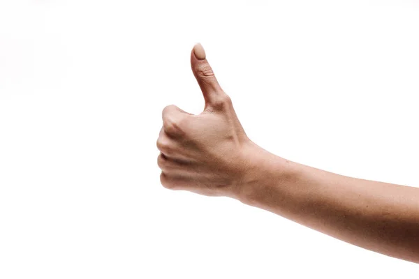 Kobieta ręka z kciukiem do góry na białym tle — Zdjęcie stockowe