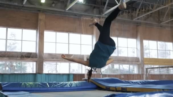 Athletes jumping on trampoline — Stock Video